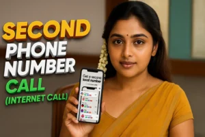 A young woman with dark hair swept to her right, adorned with a long string of white jasmine flowers over her left shoulder. She is wearing a mustard yellow saree with a gold patterned border and a matching short-sleeved blouse. She has a subtle gold chain and a red bindi on her forehead. She is holding a black smartphone in her left hand, which displays text that says "Get a second local number" and "or buy token cards." She is looking directly at the viewer with a calm smile. The background is a blurred indoor setting. To her left, the text "SECOND PHONE NUMBER CALL (INTERNET CALL)" is prominently displayed in large, bold, orange and green 3D letters.